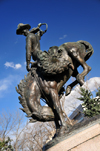 Denver, Colorado, USA: art in the Civic Center Park - sculpture 'Bronco Buster' by Alexander Phimister Proctor - cowboy taming a horse - photo by M.Torres