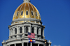 Denver, Colorado, USA: Colorado State Capitol - gilded dome - US and Colorado flags - beaux-arts Neoclassical style - photo by M.Torres