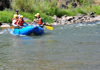 Rio Grande River, Taos County, New Mexico, USA: rafters relieved after the adrenaline rush of the rapids - photo by M.Torres