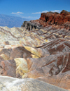 Death Valley National Park, California, USA: Zabriskie Point - undulating landscape of gullies and mud hills at the edge of the Funeral Mountains - photo by M.Torres