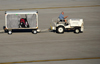 Phoenix, Arizona, USA: a tug moves baggage for US Airways - Sky Harbor International Airport - photo by M.Torres