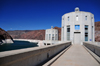 Hoover Dam, Mohave County, Arizona, USA: clock with Arizona time on a water intake tower against the Black Canyon of the Colorado River - photo by M.Torres