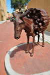 Santa F, New Mexico, USA: sculpture of a donkey carrying firewood by Charles Southard - Old Burro alley, next to the Lensic theater on San Francisco Street - photo by M.Torres