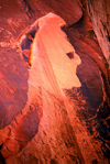 Lake Powell, Utah, USA: desert varnish creates a face in the sandstone cliffs of Iceberg Canyon - photo by C.Lovell