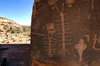 Moab, Utah, USA: petroglyphs - centipedes and men - Birthing Rock - photo by B.Cain
