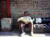 Harlem (New York): man using steet furniture (photo by J.Kaman)