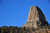 Devils Tower National Monument, Wyoming: was named in 1875 when the interpreter for Colonel Richard Irving Dodge's expedition translated the Indian name as 'Evil God's Tower' - photo by M.Torres