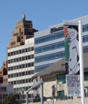 Milwaukee (Wisconsin): the flame on top of the Gas building and Ernst & Young building - museum ad - photo by G.Frysinger