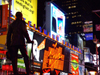 Manhattan (New York City): Times Square - George M. Cohan statue - night - city lights - photo by M.Bergsma