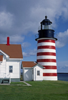 Lubec, Quoddy Narrows strait, Maine, USA: West Quoddy Head Lighthouse with distinctive red-and-white stripes - commissioned in 1808 by President Thomas Jefferson and rebuilt in 1858 - Admiralty nr H4162 - photo by C.Lovell
