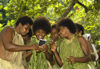 45 Vanuatu Young girls looking at polaroid, Pentecost Island (photo by B.Cain)