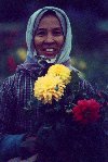 Lady with flowers (photo by Joe Filshie)