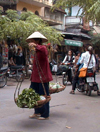 Hanoi / Ha Noi - vietnam: carrying baskets - photo by Robert Ziff