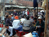 Hanoi: lunch break - outside Don Xuan market (photo by Robert Ziff)