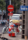Hanoi - vietnam: street corner - Pho Tran Nhan Tong - no entry sign - photo by Robert Ziff