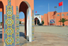Layoune / El Aaiun, Saguia el-Hamra Western Sahara: Place du Mechouar - tiles on a tower base and the congress hall - photo by M.Torres