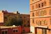 Layoune / El Aaiun, Saguia el-Hamra, Western Sahara: earth colour buildings near Blvd el-Kairaouane - photo by M.Torres