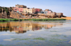 Layoune / El Aaiun, Saguia el-Hamra, Western Sahara: houses reflected on the Oued Saqui el-Hamra - photo by M.Torres