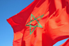 Layoune / El Aaiun, Saguia el-Hamra, Western Sahara: Moroccan flag - green Seal of Solomon - interwoven green pentagram centered on a red field - Blvd de Mekka - photo by M.Torres