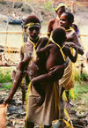 West Papua / Irian Jaya - Owus village: mother and child - photo by G.Frysinger