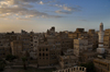 Sana'a / Sanaa, Yemen: view of the Old City at sun down - towers in the skyline - Harat Dawd quarter - UNESCO World Heritage Site - photo by J.Pemberton