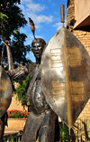 Victoria Falls, Matabeleland North, Zimbabwe: Kingdom Hotel - The Kingdom At Victoria Falls - sculpture of an African warrior with spear and shield - photo by M.Torres