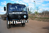 Victoria Falls, Matabeleland North, Zimbabwe: Mercedes truck at the Zimbabwe-Zambia border post - intense truck traffic crosses the border, specially carrying copper from DR Congo - 'Rainbow 112' - photo by M.Torres