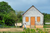 The Valley, Anguilla: old wooden building with shingles - former primary school - photo by M.Torres