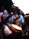 Grand Bassa County, Liberia, West Africa: Buchanan - drummer - African musician - photo by M.Sturges
