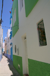 Asilah / Arzila, Morocco - blue and green houses - photo by Sandia