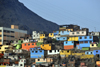 Lima, Peru: colorful shanty town under Cerro San Cristbal - photo by M.Torres
