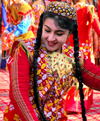 Turkmenistan - Ashgabat: happy dancer - Central Asian girl with long braids - photo by G.Karamyancr