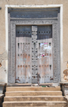 Stone Town, Zanzibar, Tanzania: old hand-carved ornamented wooden door - Mizingani Road - photo by M.Torres